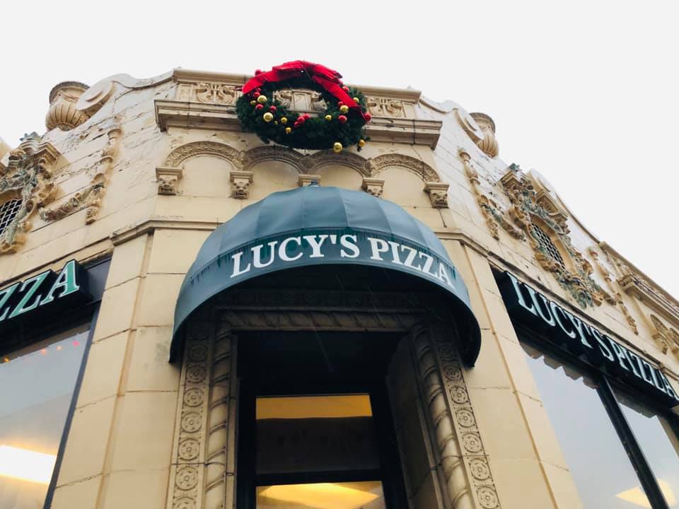 Lucy's signature pizza with fresh ingredients